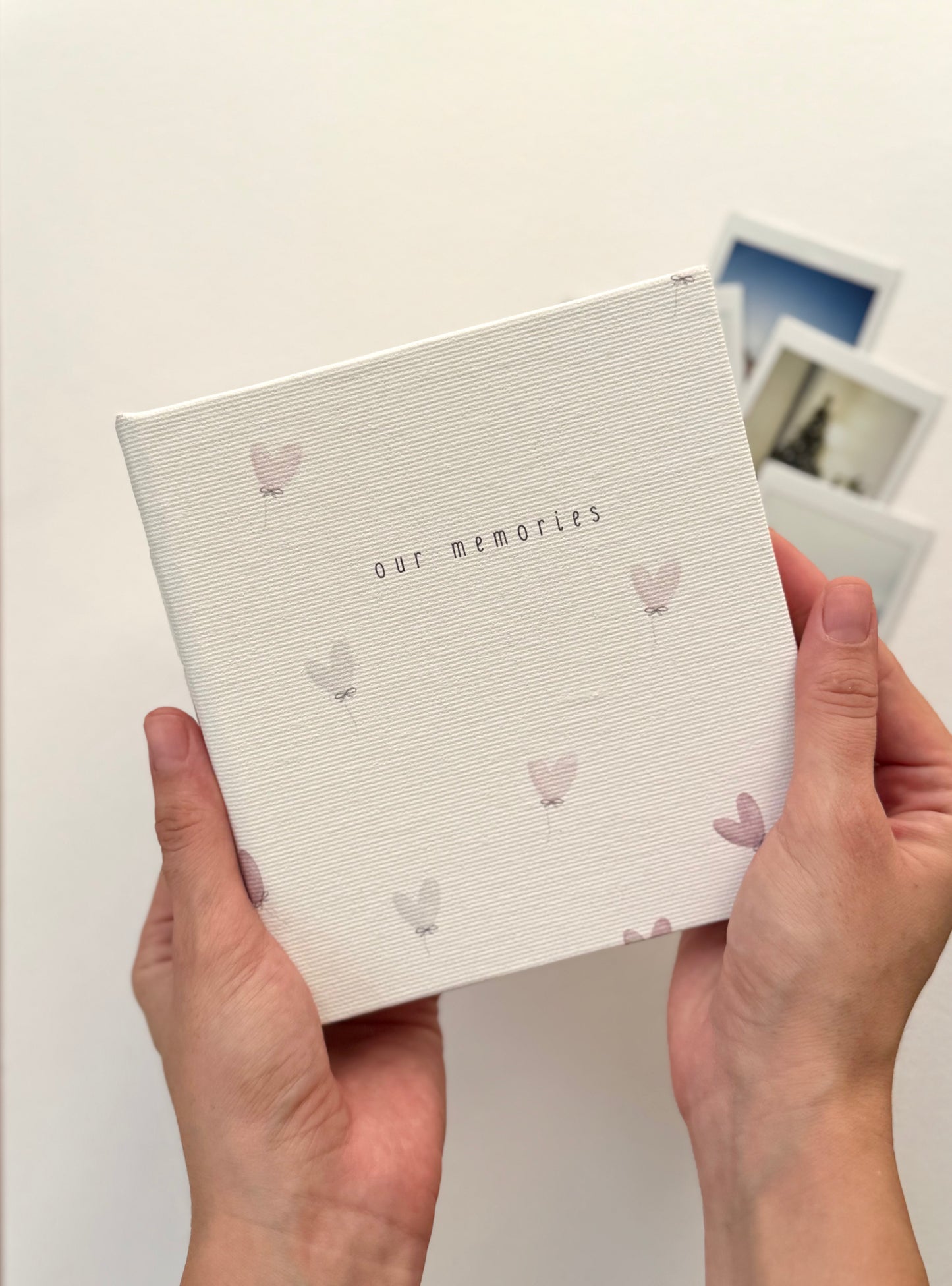 Personalized Polaroid photo album with 48 pages and custom name on cover.