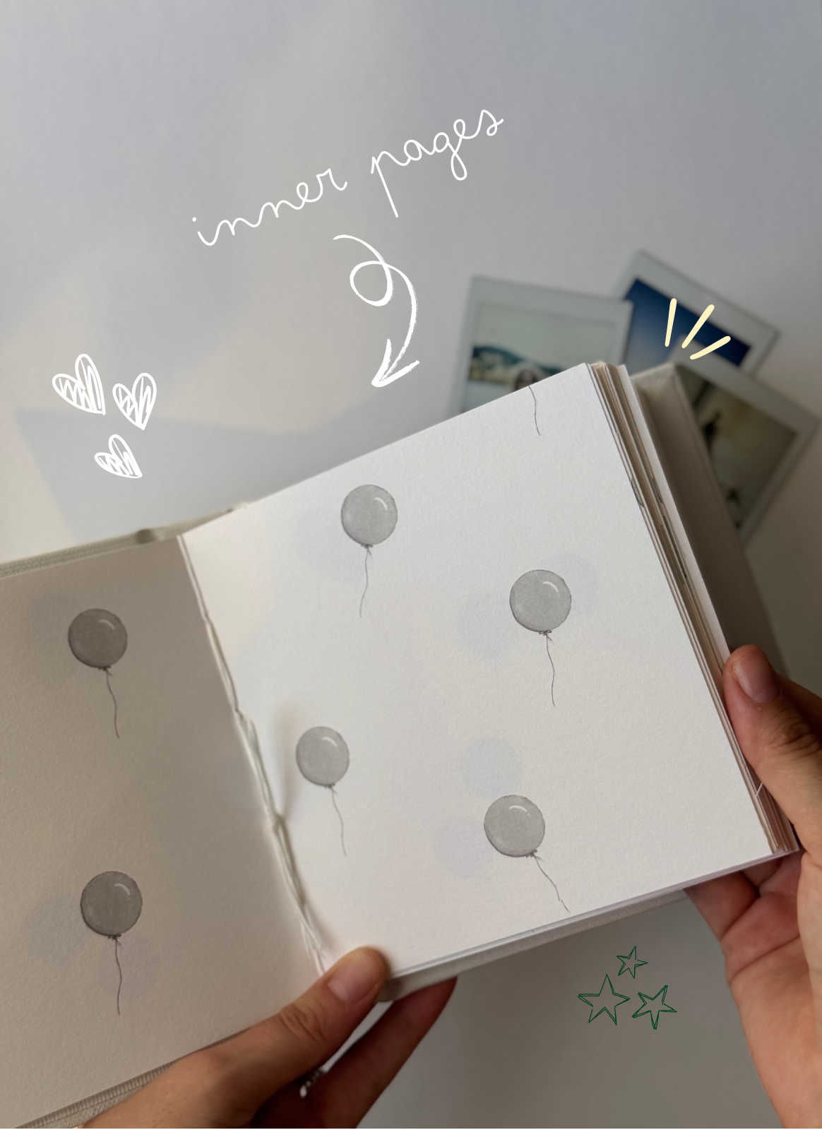 Inside pages of 48-page Polaroid photo album for photos, tickets, and stickers. Green balloon pages of the photo album book